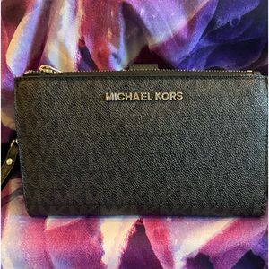 Michael Kors black with silver hardware wristlet